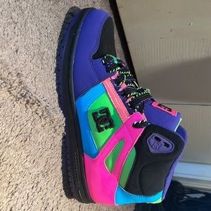 Multi color DC size 7.5, brand new, never worn.